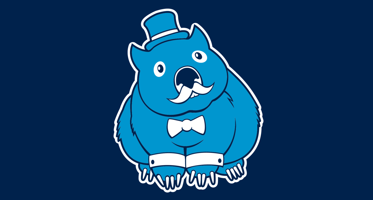 A fancy pants wombat wearing a top hat and dressed to the nines, then slathered on a t-shirt